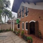 Linda casa á venda com 3 suítes piscina 4 vagas de garagem  Enseada Guarujá SP