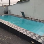 1 dormitório  1sala 1 cozinha 1 banheiro  1 lavanderia  1 piscina  1 área de churrasco