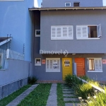 Casa com 3 quartos à venda na Rua Henrique Anawate, 480, Guarujá, Porto Alegre