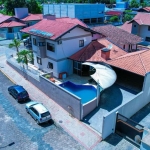 Casa à venda com 3 dormitórios (1 suíte) e piscina no bairro Estados - Indaial/S