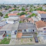 Casa com edícula de frente para rua à venda, com 3 quartos sendo 1 suíte, no Bairro Xaxim, Curitiba/PR.