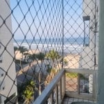 Apartamento em prédio frente mar