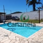 Casa com 3 dormitórios (1 suíte) e piscina no Nossa Senhora dos Navegantes - Cananéia / SP