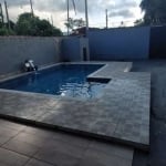 Casa com 2 dormitórios e piscina para venda no bairro Vila Cabana em Cananéia-SP