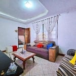 Vendo lindo sobrado de 128m² com 2 quartos, 2 banheiros, terraço com churrasqueira e 2 vagas de garagem próximo ao Shopping Maia.