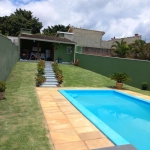 Casa térrea na Vila Santista em Atibaia SP.  4 dormitórios,  piscina,  espaço gramado e área gourmet.