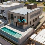 Casa de alto padrão em condomínio Alphaville: 3 quartos, 3 suítes, 3 salas, 6 banheiros, 6 vagas de garagem, 501,98 m². Venda em Santana de Parnaíba-SP.