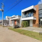 Condomínio fechado - 02 quadras do Zaffari Ipanema&lt;BR&gt;Casa 3 Suítes. Living com amplas aberturas, pé direito duplo, lareira, cozinha americana, churrasqueira integrado ao pátio privativo. Mezani