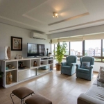 Apartamento possui 3 dormitórios, sendo 1 suíte, semi-mobiliado, com 107,27m² de área privativa, living para 2 ambientes, espaço gourmet com churrasqueira, cozinha com área de serviço; 2 vagas simples