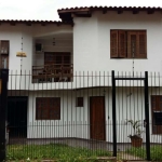 Casa Residencial no bairro Nonoai de 4 dormitórios