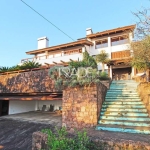 Casa com 4 quartos à venda na Rua Dona Lida Monteiro, 180, Teresópolis, Porto Alegre