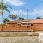 Casa com 3 dormitórios para alugar, 139 m² por R$ 4.370,00/mês - Guarujá - Porto Alegre/RS