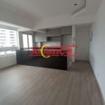 Apartamanto Lindo na vila milton Com sacada piscina e salão de jogos e churrasqueira .