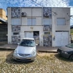 Terreno à venda de 300m² no bairro Planalto com Galpão e 2 sobrados de fundo.