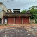 Casa com 3 garagens individuais