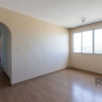 Otima localização!&lt;BR&gt;apartamento com living para dois ambientes, dois dormitorios, banheiro, área de serviço separada e com  banheiro auxiliar.&lt;BR&gt;Piso laminado,&lt;BR&gt;andar alto.&lt;B