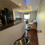 Apartamento no bairro São João em Porto Alegre. living 2 ambientes, cozinha americana e lavanderia, 2 dormitórios. 1 vaga de garagem coberta. Condomínio com quiosque/salão de festas no terraço. Próxim