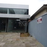 Loja comercial localizada no bairro Vila Ipiranga, com 150m². Imóvel com 02 banheiros, cortina automatizada, escada em granito e piso porcelanato. Localizado na Avenida Brasilia, próximo a academias, 