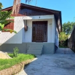 Belíssimo terreno 10m X 31m, alto, com vista panorâmica para os Jardim Planalto&lt;BR&gt;Vista perene. Próximo do Triângulo da Assis Brasil. Terreno com casa antiga de 60.m2, árvores frutíferas, terre