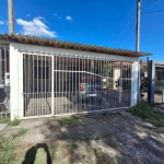 Casa a Venda no Loteamento Moradas do Sul, com 2 dormitórios, amplo living, cozinha com moveis planejados, banheiro social com box de vidro, 2 vagas de garagem  cobertas e com portão de contrapeso, pá