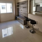 Excelente apartamento de 2 dormitórios, semi mobiliado. &lt;BR&gt;Cozinha planejada com banquetas, cooktop e forno, sala com rack, quarto principal com closet, cabeceira e ar condicionado.&lt;BR&gt;Co