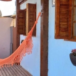 Casa térrea de 2 dormitórios, living, cozinha, churrasqueira, área de serviço, banheiro social, vaga para 2 automóveis.