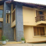 Casa de 370m² - 4 dormitórios, 2 suítes e 4 vagas de garagem no bairro Espírito Santo