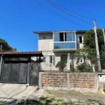 Casa em Porto Alegre, no bairro Vila Nova, com 3 dormitório(s), e 3 banheiros, à venda.