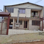 CASA À VENDA COM 5 QUARTOS, 2 COZINHAS, 2 BANHEIROS E PÁTIO GRANDE - VIAMÃO - R$ 650.000,00