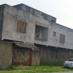 Sobrado em Construção: Primeiro piso 1 banheiro, 2 salas que poderá usar como residencial ou comercial com entrada independente. Segundo piso com 3 dormitórios com suíte, closet e sacada, sala de esta