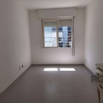 Apartamento térreo de 1 dormitório totalmente reformado bairro Passo da Areia em Porto Alegre. &lt;BR&gt;Dormitório grande, living (sala) 2 ambientes, banheiro social com ventilação direta, cozinha am