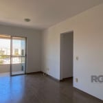 Apartamento de 60m², 2 dormitórios, sacada com churrasqueira, living com dois ambientes, cozinha ampla, área de serviço separada, um banheiro social e uma vaga de garagem. Vista linda para a cidade e 