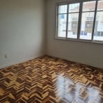 Apartamento 2 dormitórios, sala dois ambientes, cozinha e área de serviço. Com garagem escriturada. Marque sua visita.