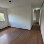 Apartamento totalmente reformado, com 60,95m² de área privativa no bairro Teresópolis. Possui hall de entrada em piso frio, living amplo para dois ambientes, uma cozinha com pia em mármore e integrada