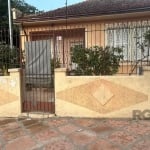 Ótima casa ,no bairro Partenon, 3dormitorios, living amplo, banheirosocial, cozinha, área de serviçocomchurrasqueira, deposito, baheiro auxiliar. pátio amplo,espaçopara piscina, 2 garagens cobertas. G