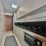 Este apartamento de 2 dormitórios, sendo 1 suíte, está situado no bairro Zona Nova, em uma localização privilegiada. Totalmente mobiliado e decorado, o imóvel oferece um ambiente moderno e aconchegant