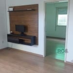 Apartamento de 1 dormitório com 41,40m². sala jantar e estar, cozinha conjugada com lavanderia, banheiro social, 1 vaga garagem.  Ficam no imovel: ar condicionado, luminária e painel da TV&lt;BR&gt;Co