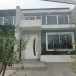 Sobrado de Alto Padrão à Venda - Bairro Nossa Senhora das Graças, Canoas&lt;BR&gt;&lt;BR&gt;Com um projeto sofisticado e espaços amplos, este sobrado oferece 4 dormitórios (2 suítes com closet), salas