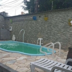 Sobrado com piscina e 2 quartos à venda, 210 m² por R$ 850.000 - Aviação - Praia Grande/SP