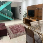 Sobrado com 3 dormitórios à venda, 200 m² por R$ 1.000.000,00 - Vila Guilhermina - Praia Grande/SP