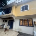 Casa com 3 dormitórios para alugar, 170 m² por R$ 15.380,00 - Gonzaga - Santos/SP