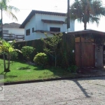 Sobrado com 4 dormitórios à venda, 167 m² por R$ 958.000,00 - Balneário Cidade Atlântica - Guarujá/SP