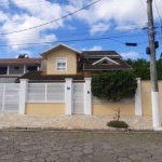 Casa com 6 dormitórios à venda, 440 m² por R$ 2.800.000,00 - Arrastão - São Sebastião/SP