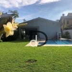 Deliciosa casa de praia térrea com 4 suítes a poucos passos do mar disponível para locação de diárias