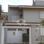 Casa com 3 quartos à venda na Rua Mathilde Zatar, 261, Nonoai, Porto Alegre