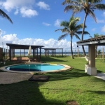 Casa à VENDA na praia situada em Vilas do Atlântico, Lauro de Freitas - BA.   3 quartos  todos suítes  armários planejados  piscina espaço gourmet  amplo terreno  excelente opção!