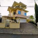 Casa com 3 suítes à venda, 245 m² por R$ 2.100.000 - Pedra Branca - Palhoça/SC