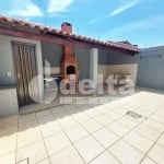 Casa residencial disponível para venda no bairro Segismundo Pereira em Uberlândia-MG