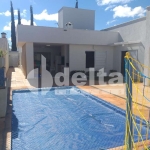 Casa residencial disponível para venda no bairro Jardim Karaíba em Uberlândia-MG