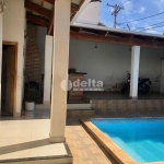 Casa residencial disponível para venda no bairro Vigilato Pereira em Uberlândia-MG